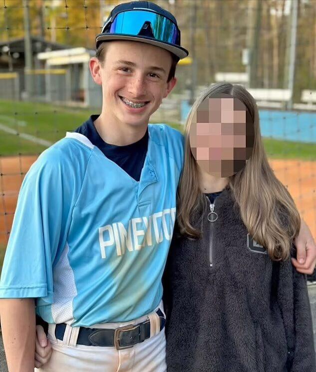 Miller Gardner and friend on baseball field