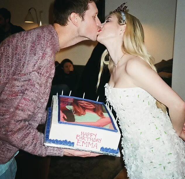 Emma Roberts kissing her fiance