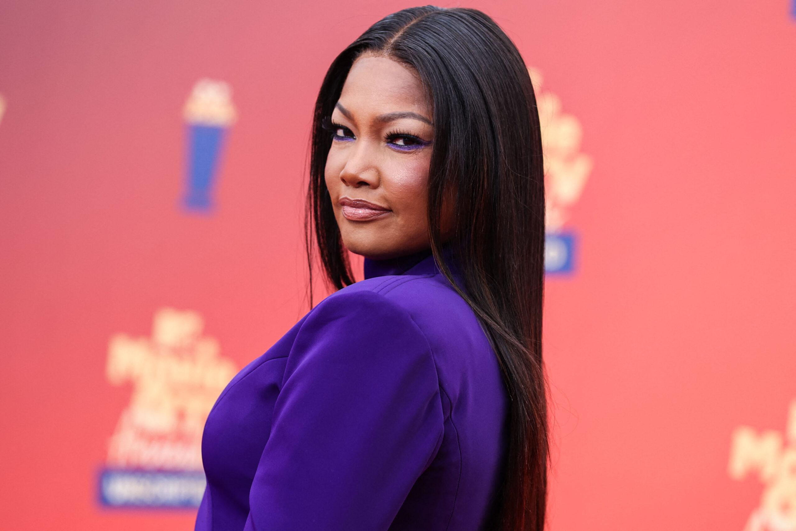 Garcelle Beauvais posing on the red carpet.