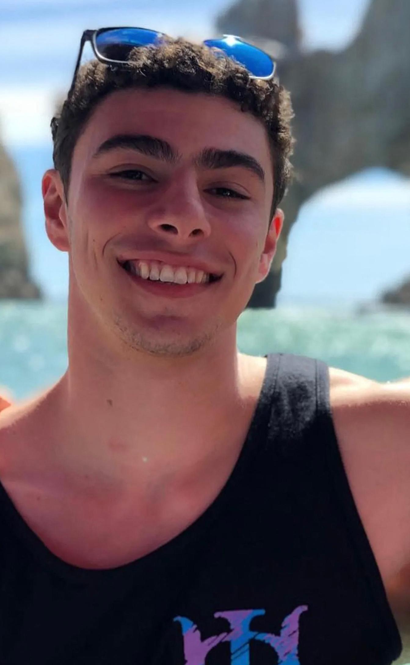 Luigi Mangione smiling