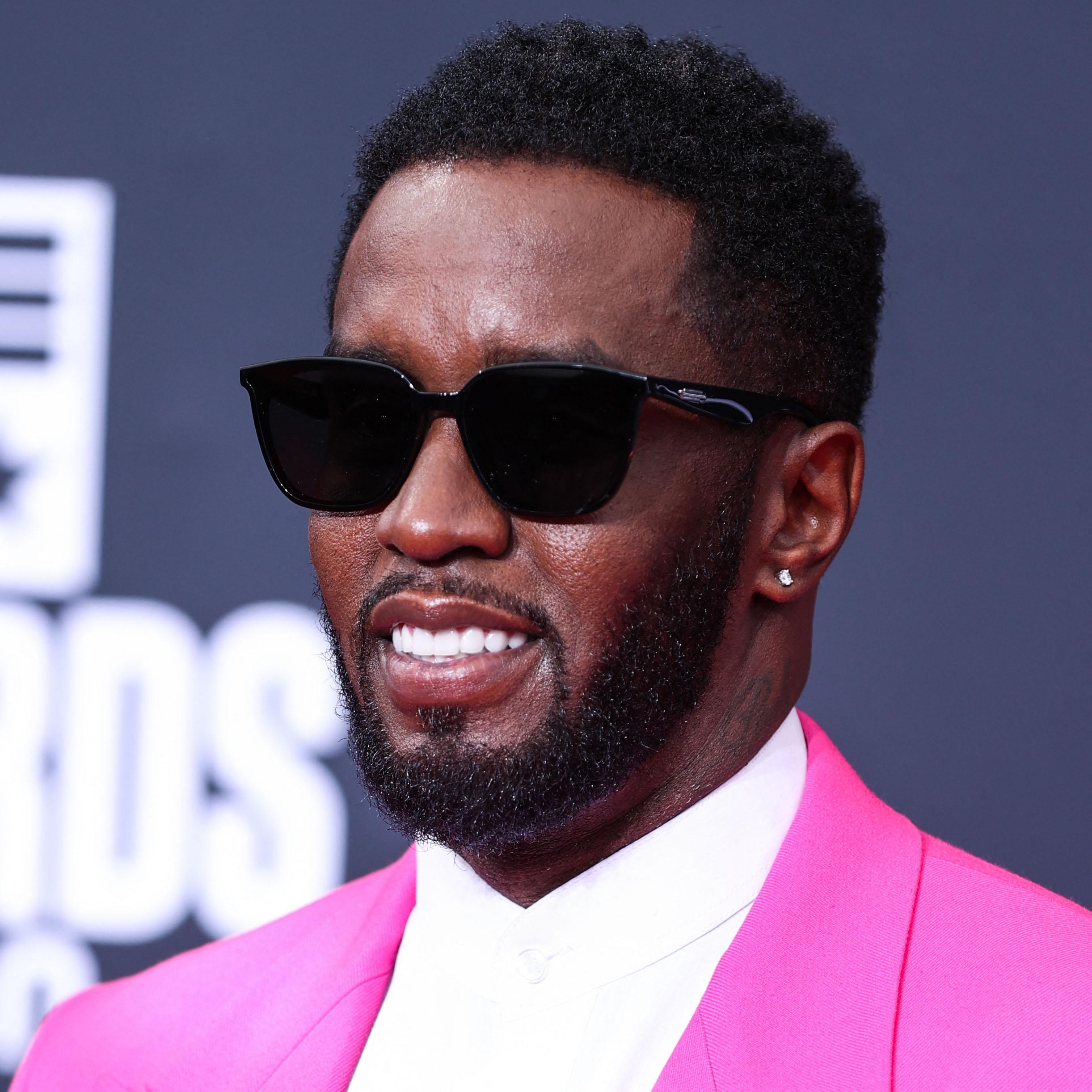 Diddy posing on the red carpet.