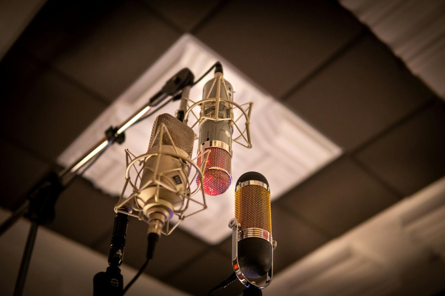 Professional recording studio with microphone and soundproof booth for voice acting work