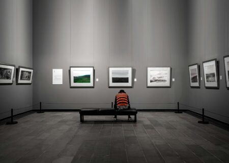 How Timothée Chalamet’s Art Collection Is Influencing Young Hollywood’s Investment Choices Contemporary art gallery interior with paintings displayed on white walls and professional lighting