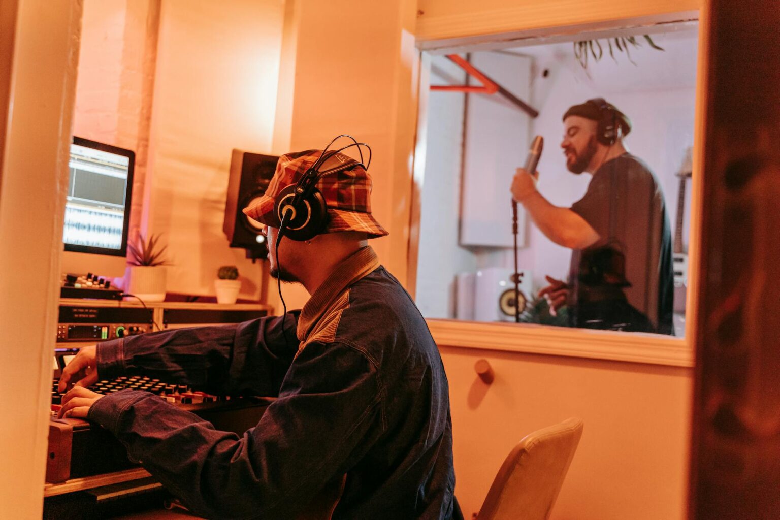 How Dua Lipa’s Record Label Is Discovering Artists Through TikTok Professional music recording studio with mixing board and microphones