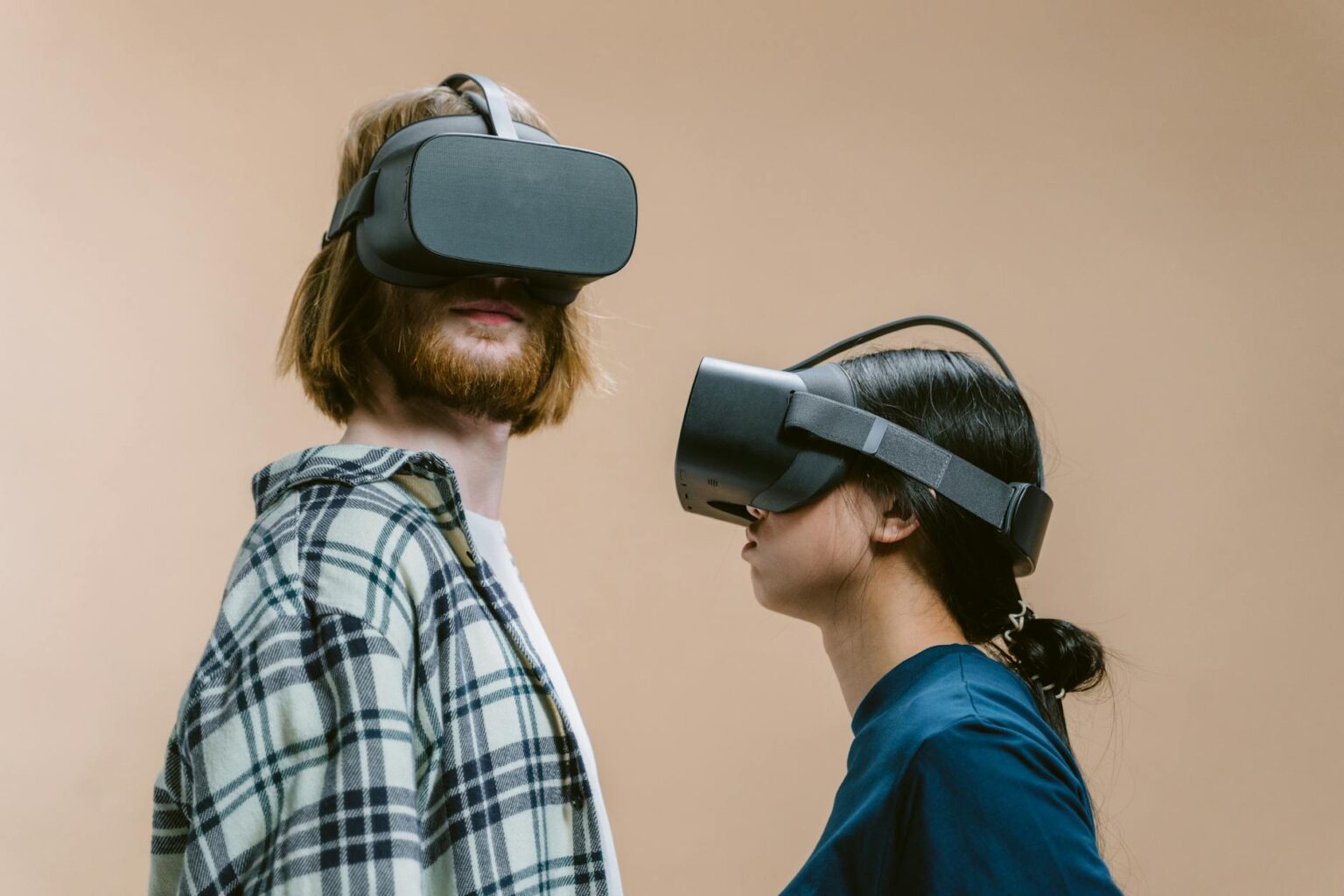 Person wearing VR headset in modern indoor setting, representing virtual reality technology adoption