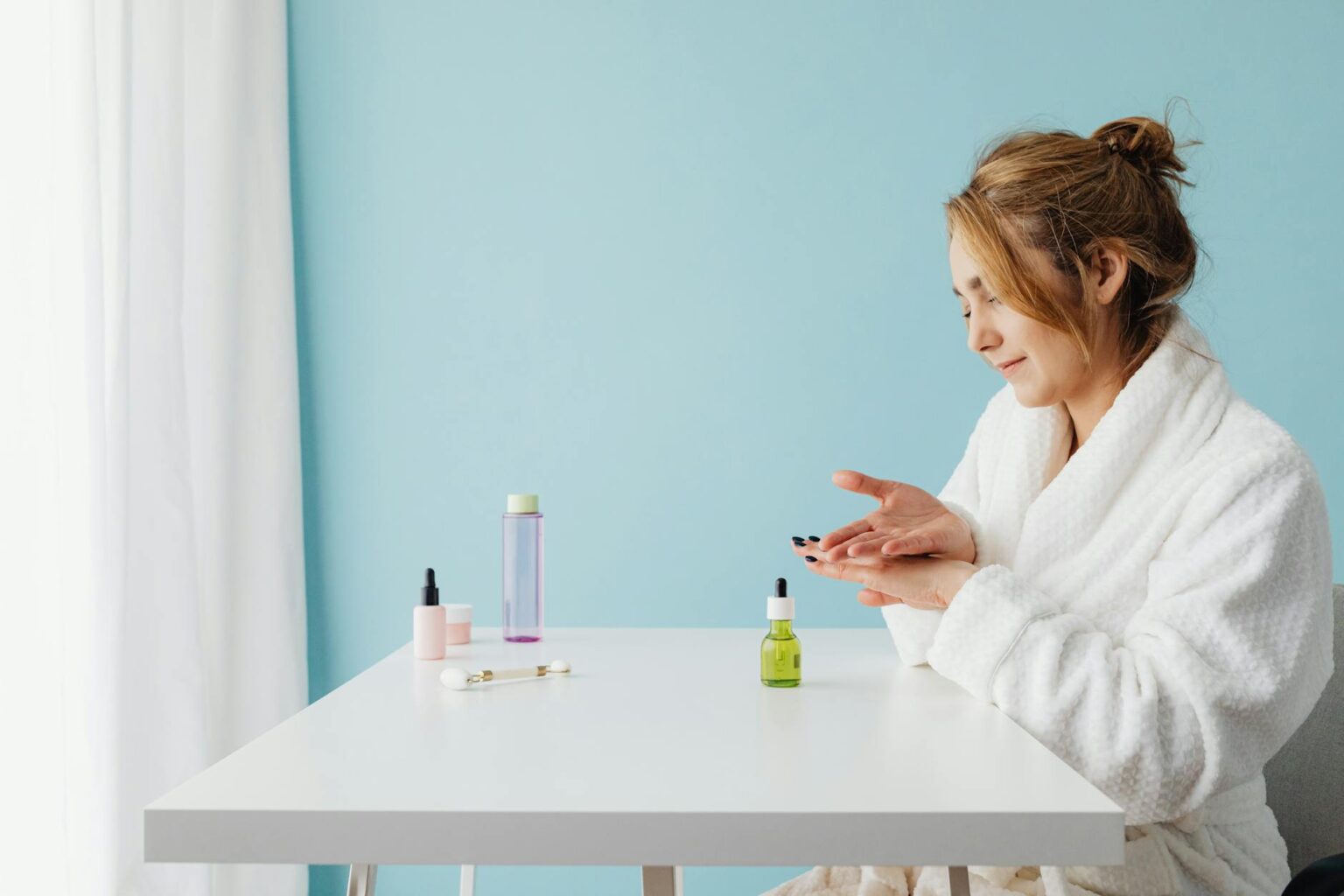 How Scarlett Johansson’s Skincare Line Is Disrupting Clean Beauty Standards Minimalist skincare products arranged on clean white surface