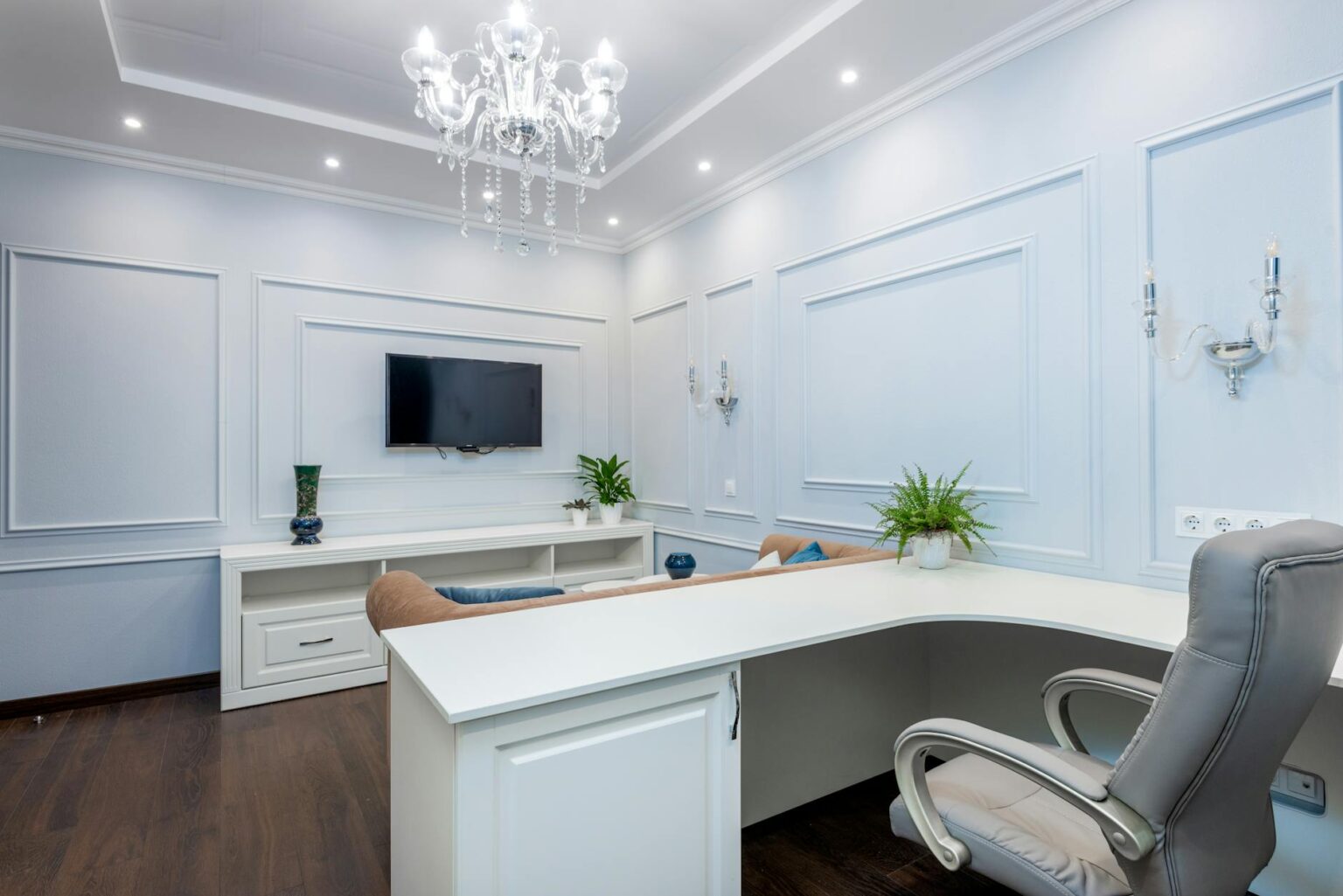 Professional executive working alone in modern home office setting