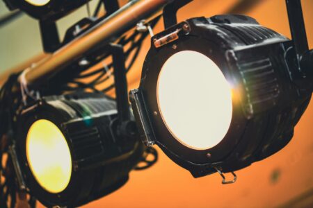 How Ariana Grande’s Broadway Investment Strategy Is Reshaping Theater Funding Broadway theater stage with dramatic lighting and empty seats