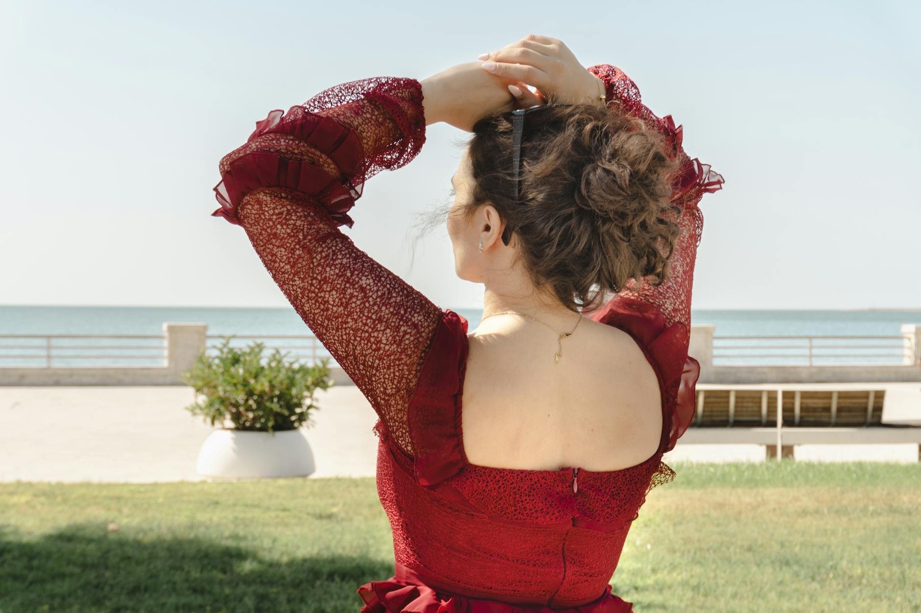 Stylish midi length dress displayed on mannequin in neutral lighting