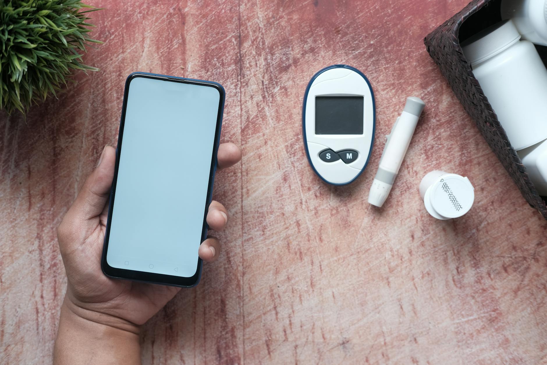 Various health tracking devices and technology on a clean surface