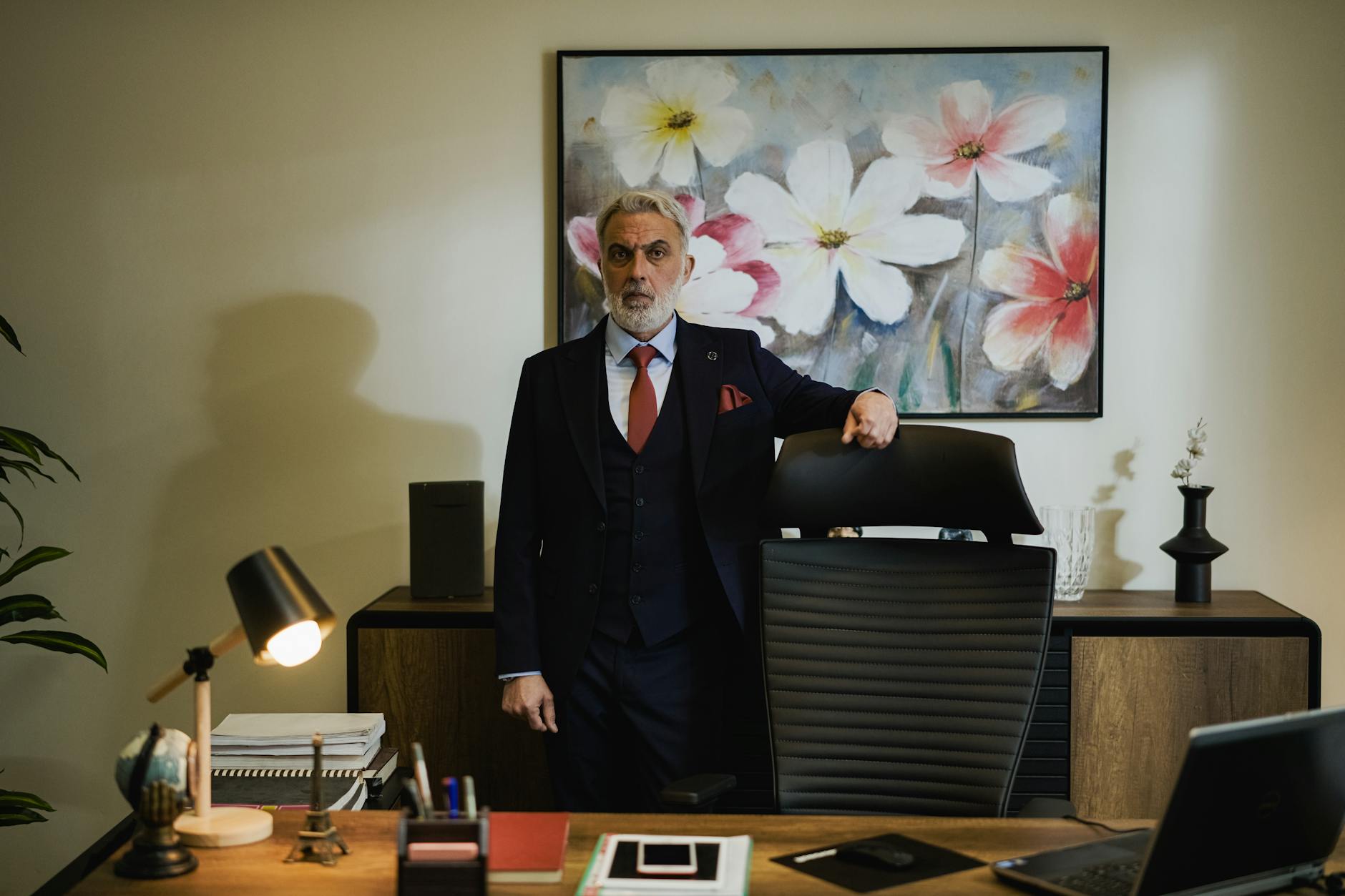 Clean modern executive office desk with healthy snack and water bottle