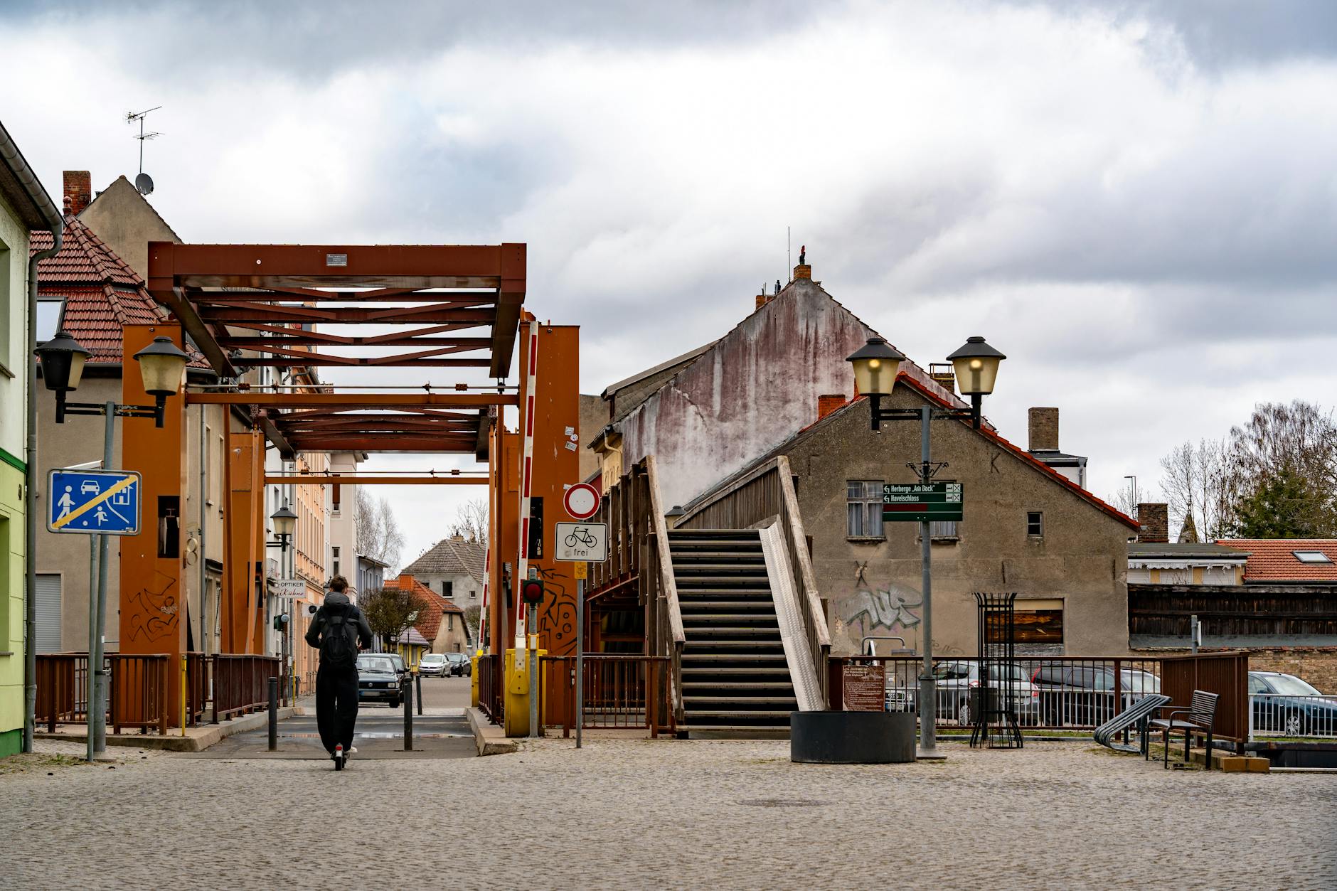 Charming mountain town main street with local businesses and mountain backdrop
