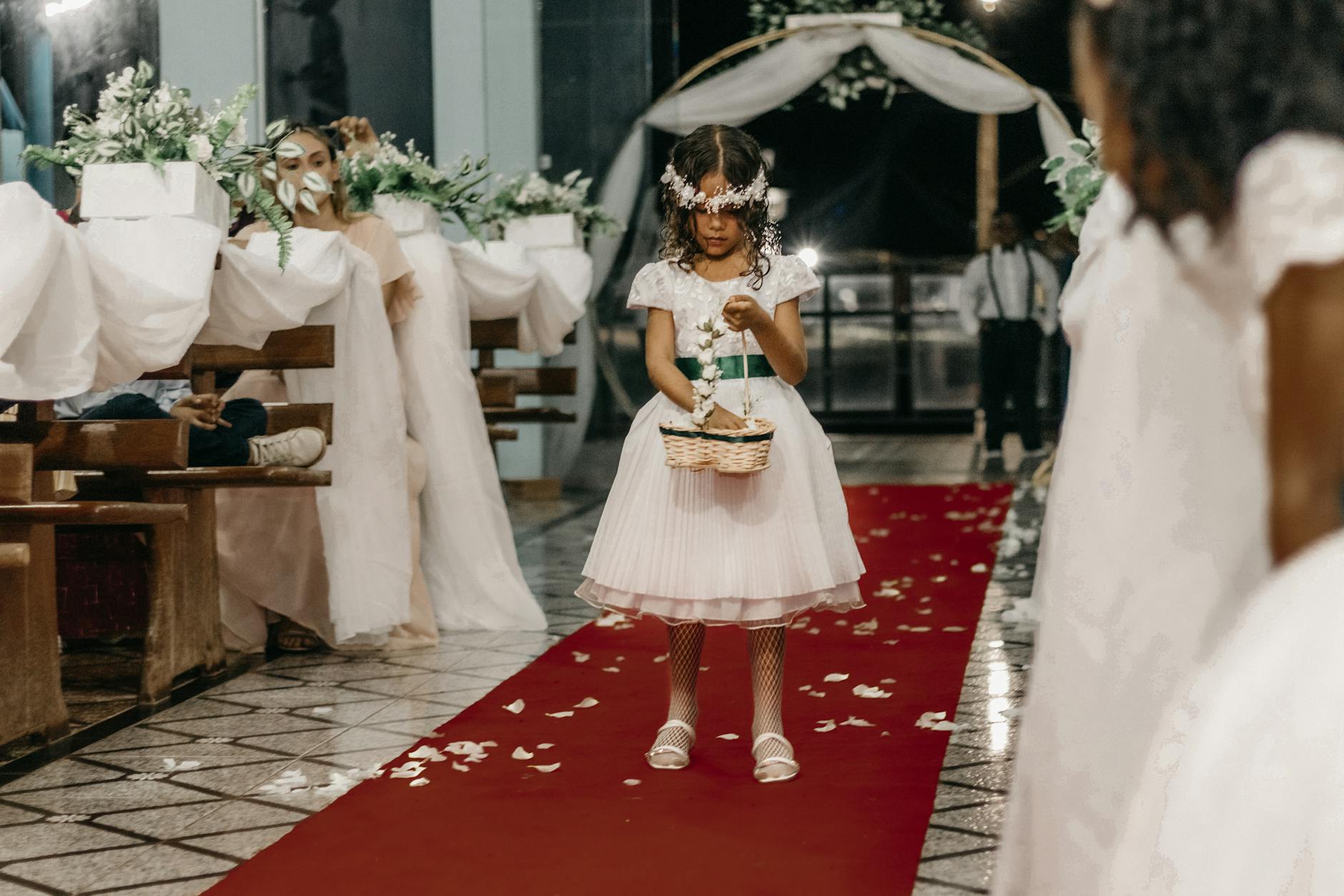 Elegant red carpet setup with photographers and lighting equipment