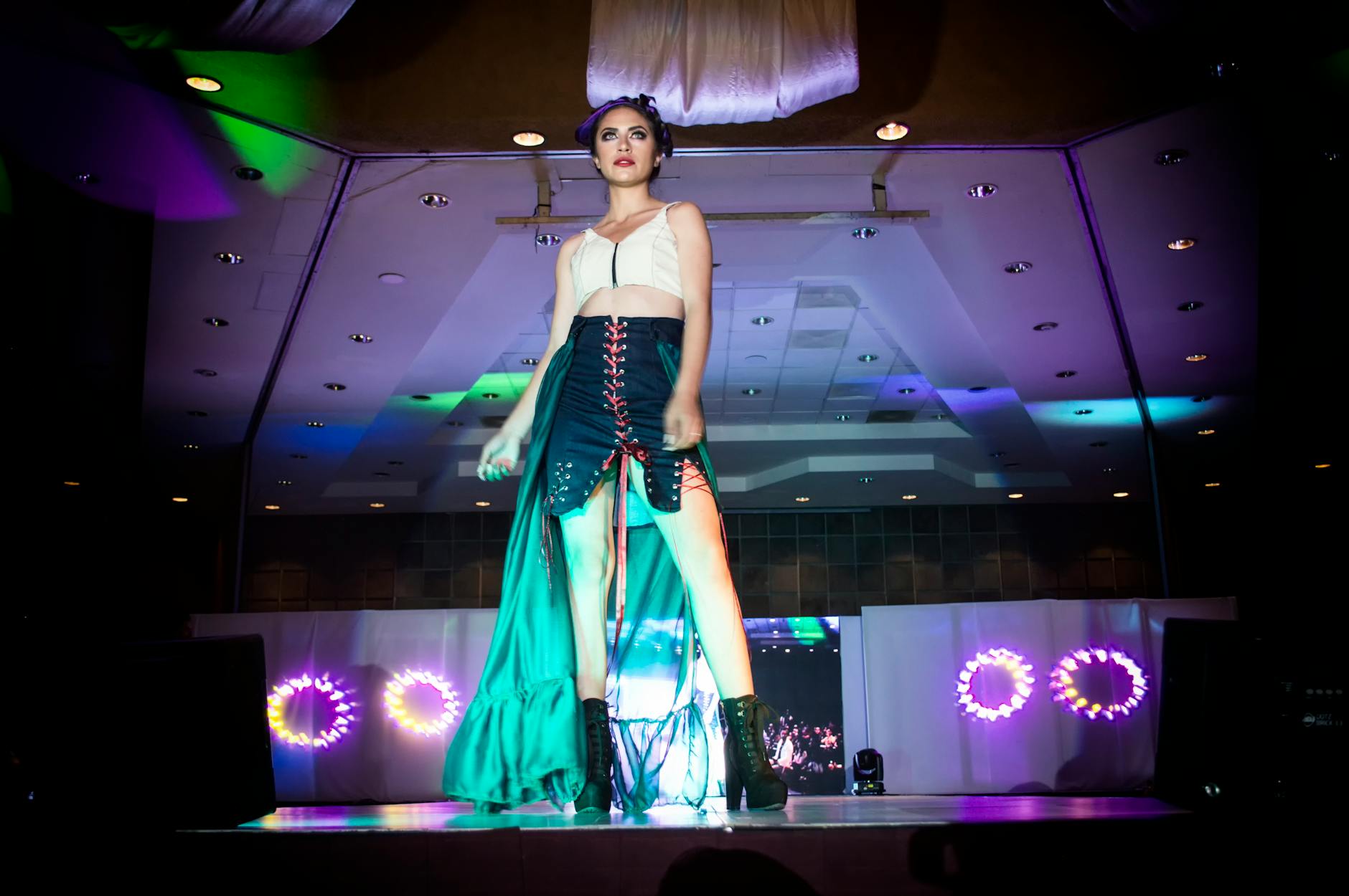 Fashion runway showing models in clean minimalist designs and neutral colors