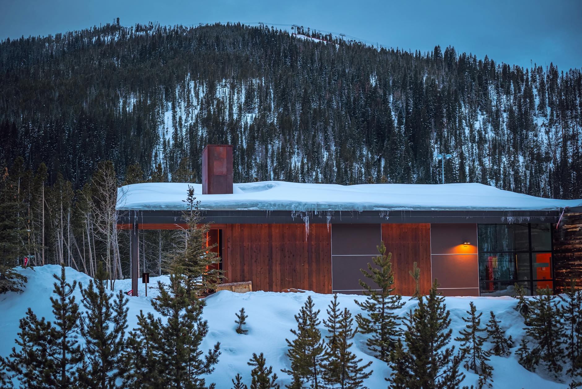 Luxury wellness retreat nestled in mountain landscape