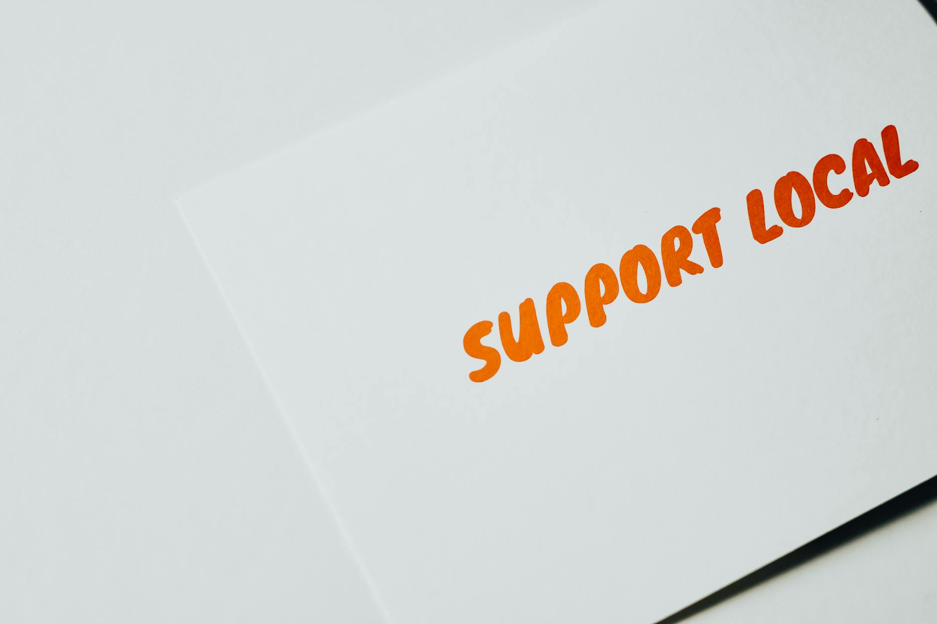 Group of young people in supportive community discussion setting