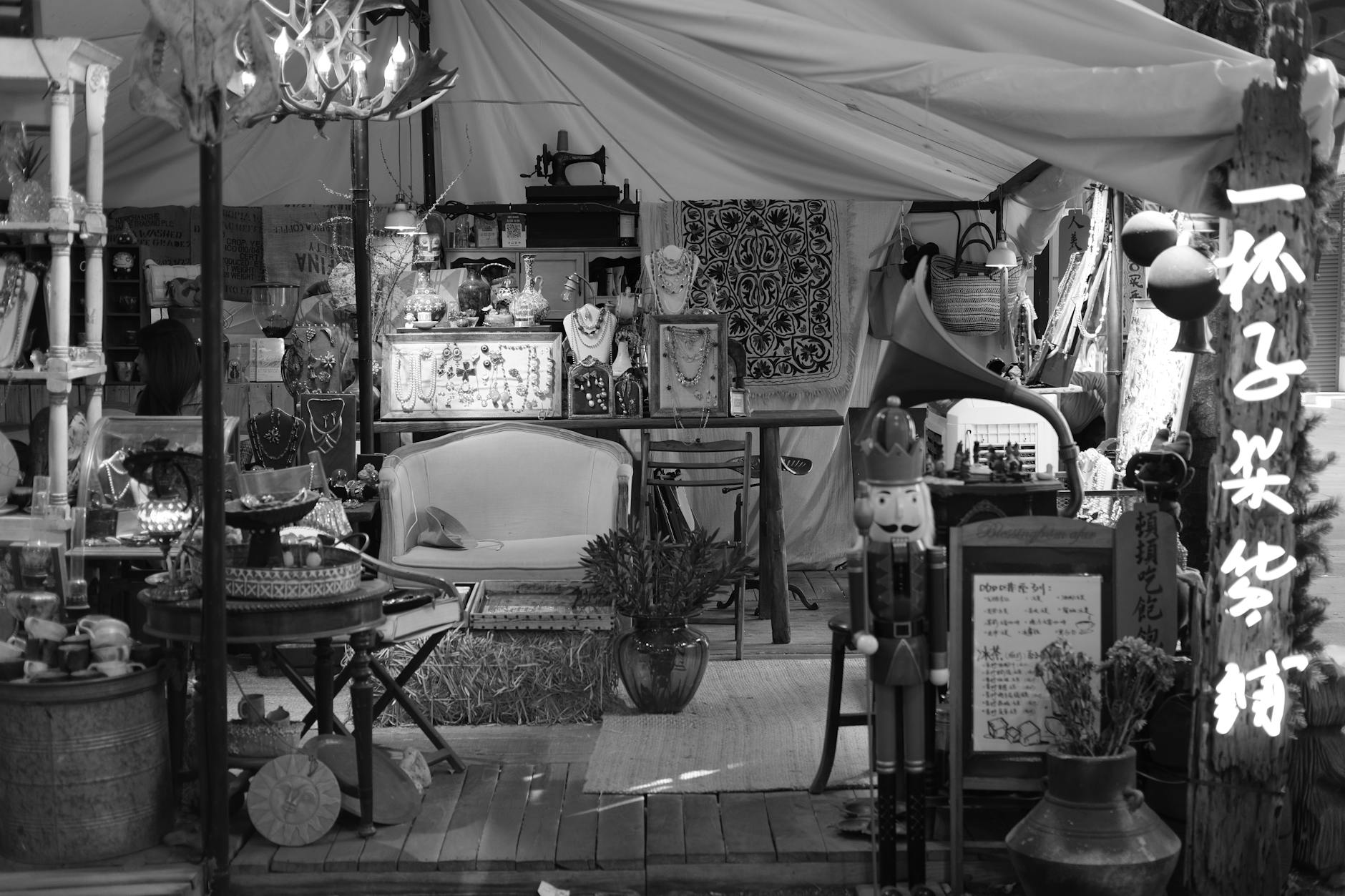 Interior of an upscale vintage clothing boutique with curated designer pieces on display