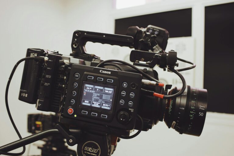 Professional film camera and lighting equipment on movie set