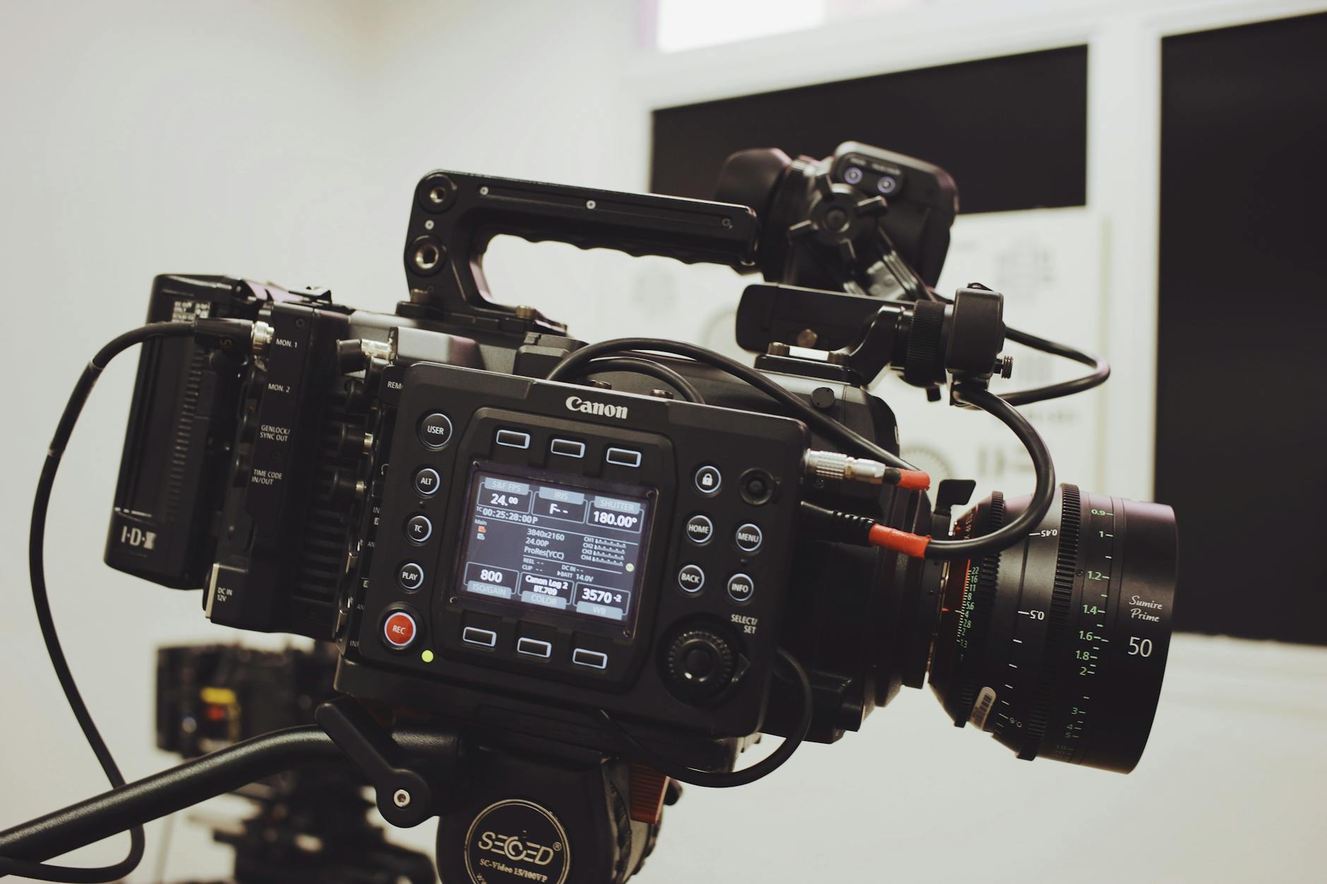 Professional film camera and lighting equipment on movie set
