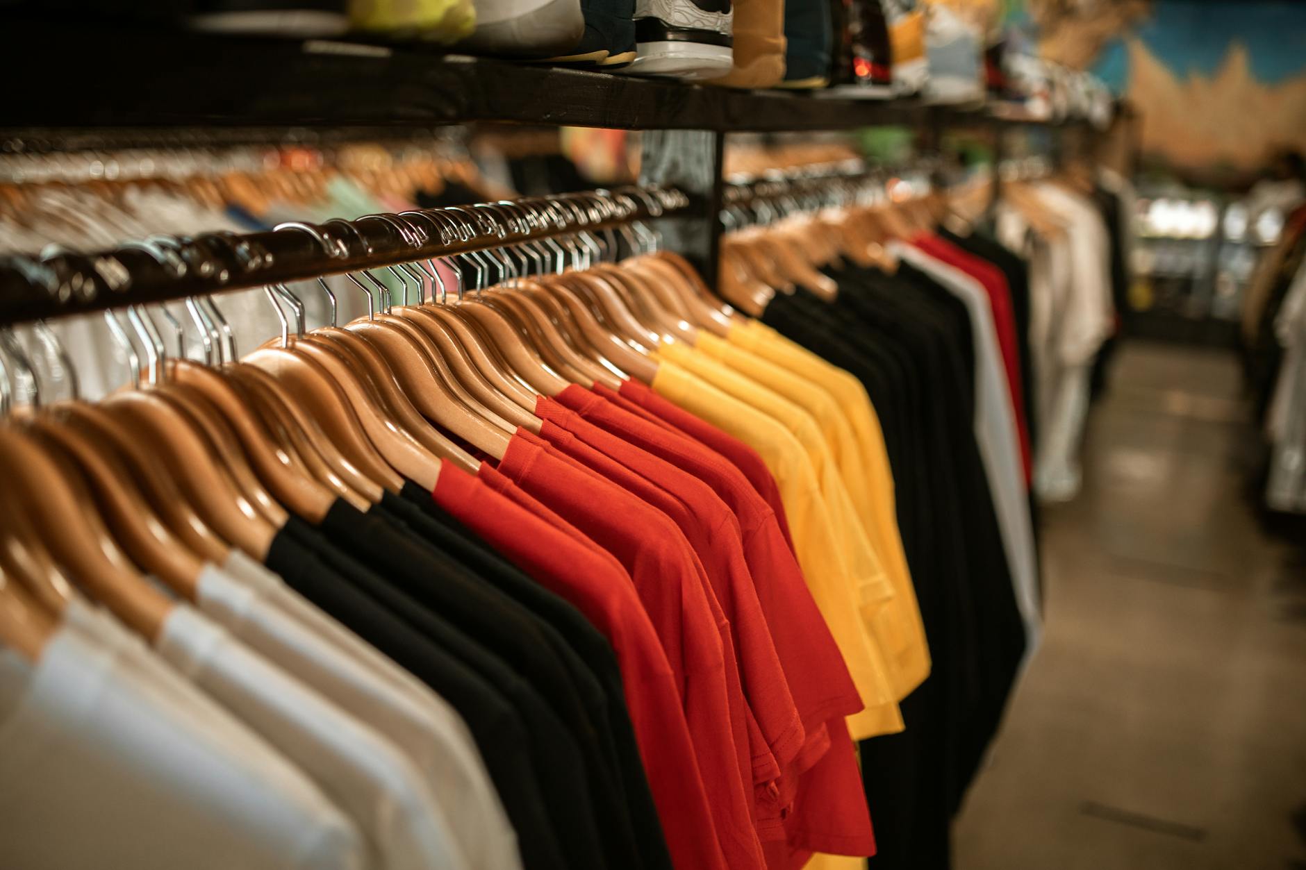 Colorful merchandise items displayed on a retail table at an event