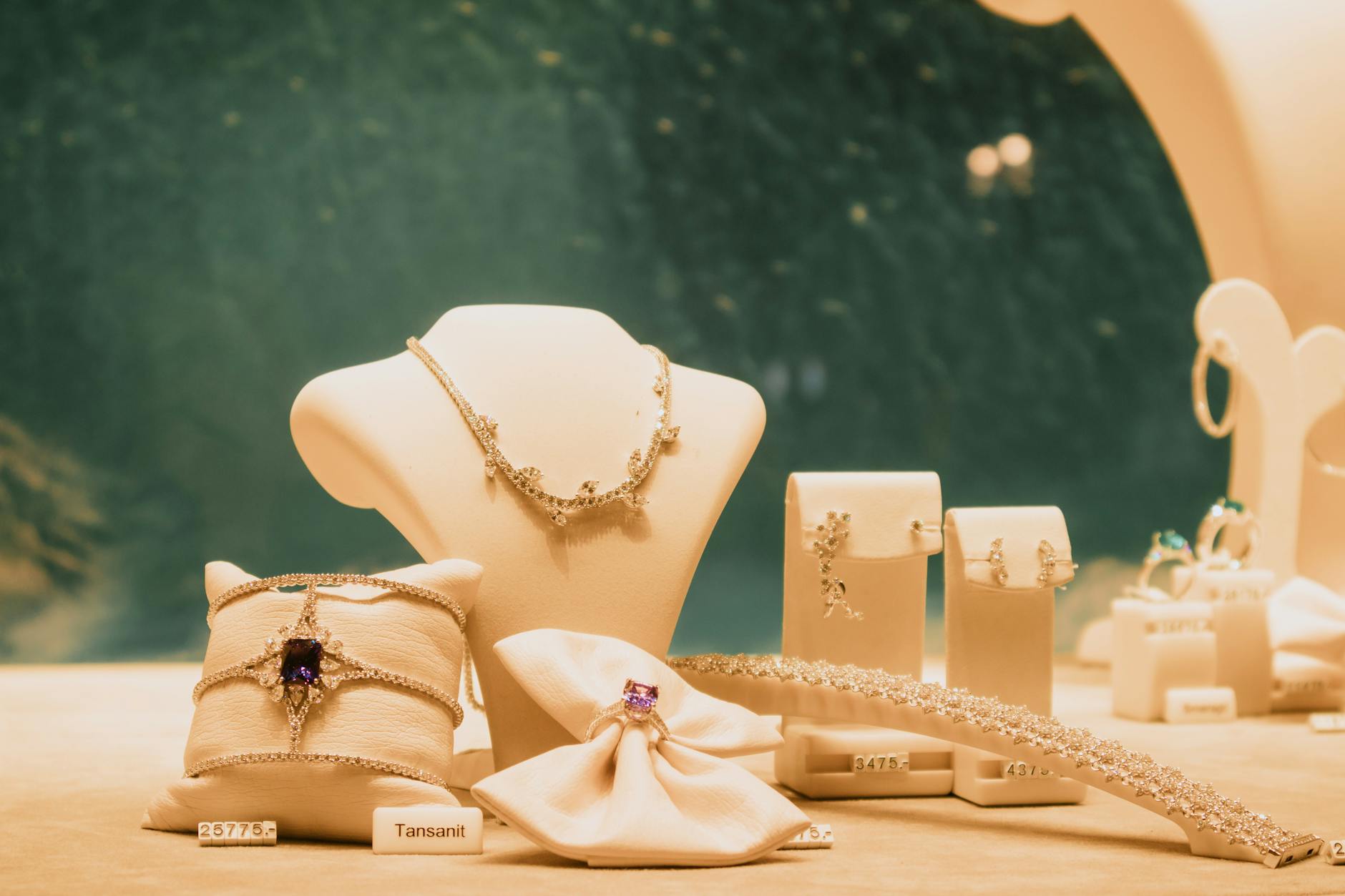 Fine jewelry pieces arranged in an upscale retail display