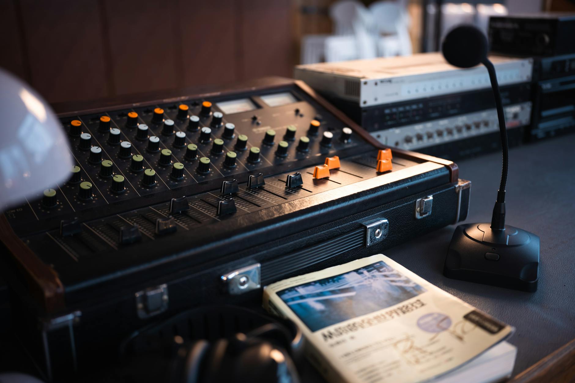 Modern television news desk setup with monitors and broadcast equipment