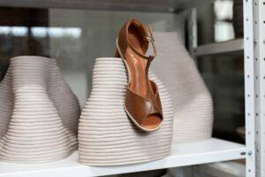 Hermès Oran Sandals Are Quietly Replacing Summer’s It-Shoe Close-up of a minimalist leather flat sandal on a clean surface