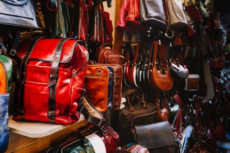 Celine’s Structured Handbags Are Reclaiming Shelf Space From Loewe Structured designer handbags displayed on a minimalist shelf in a luxury boutique