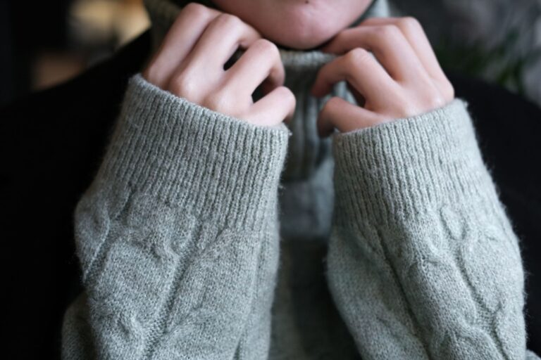 Close-up of finely crafted luxury knitwear showing texture and detail