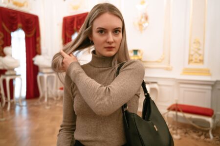 A folded cashmere overshirt in neutral tone representing luxury outerwear