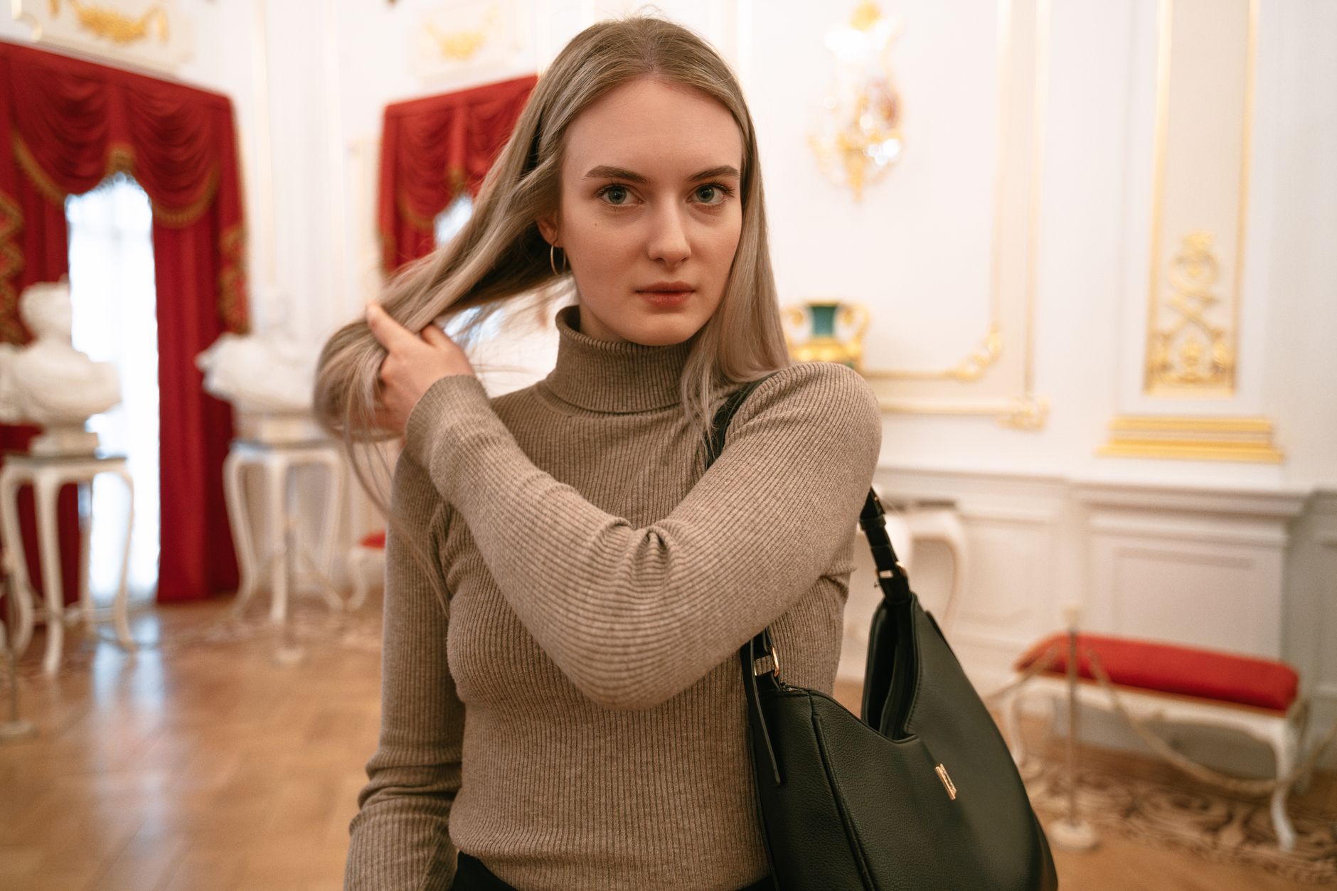 A folded cashmere overshirt in neutral tone representing luxury outerwear