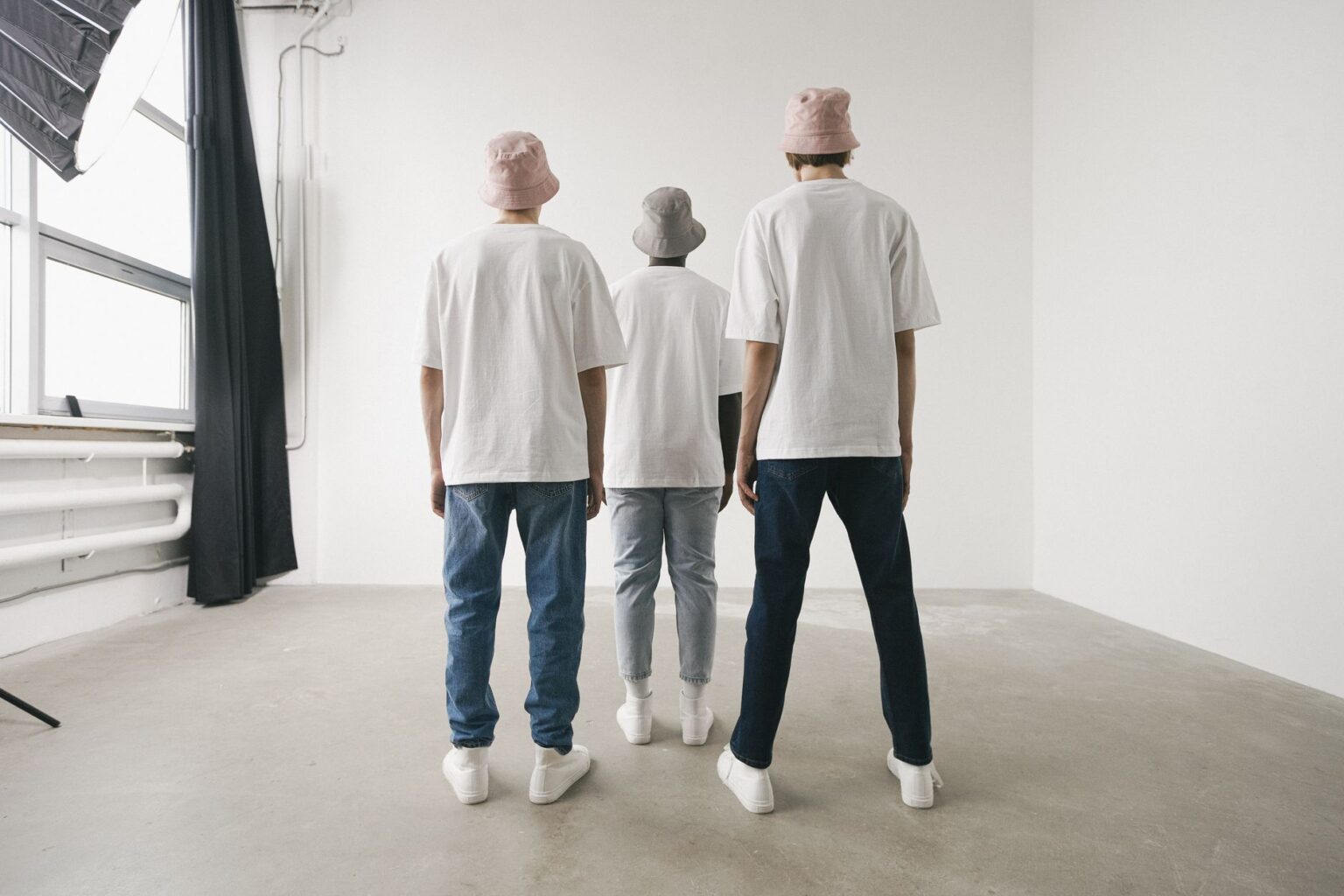 Zara Archetypes Are Quietly Closing the Gap on Designer Basics Neatly folded neutral-toned basics including a white shirt and stone trousers on a clean surface