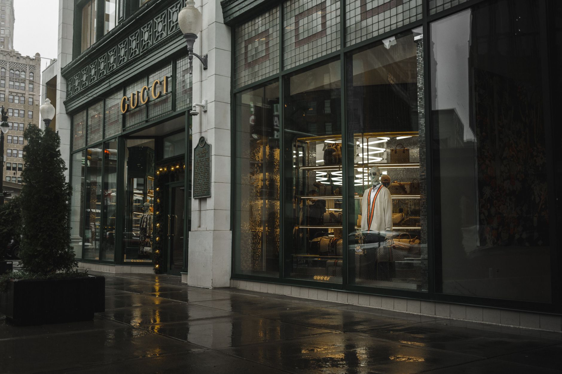 Interior of a high-end fashion boutique with curated clothing displays