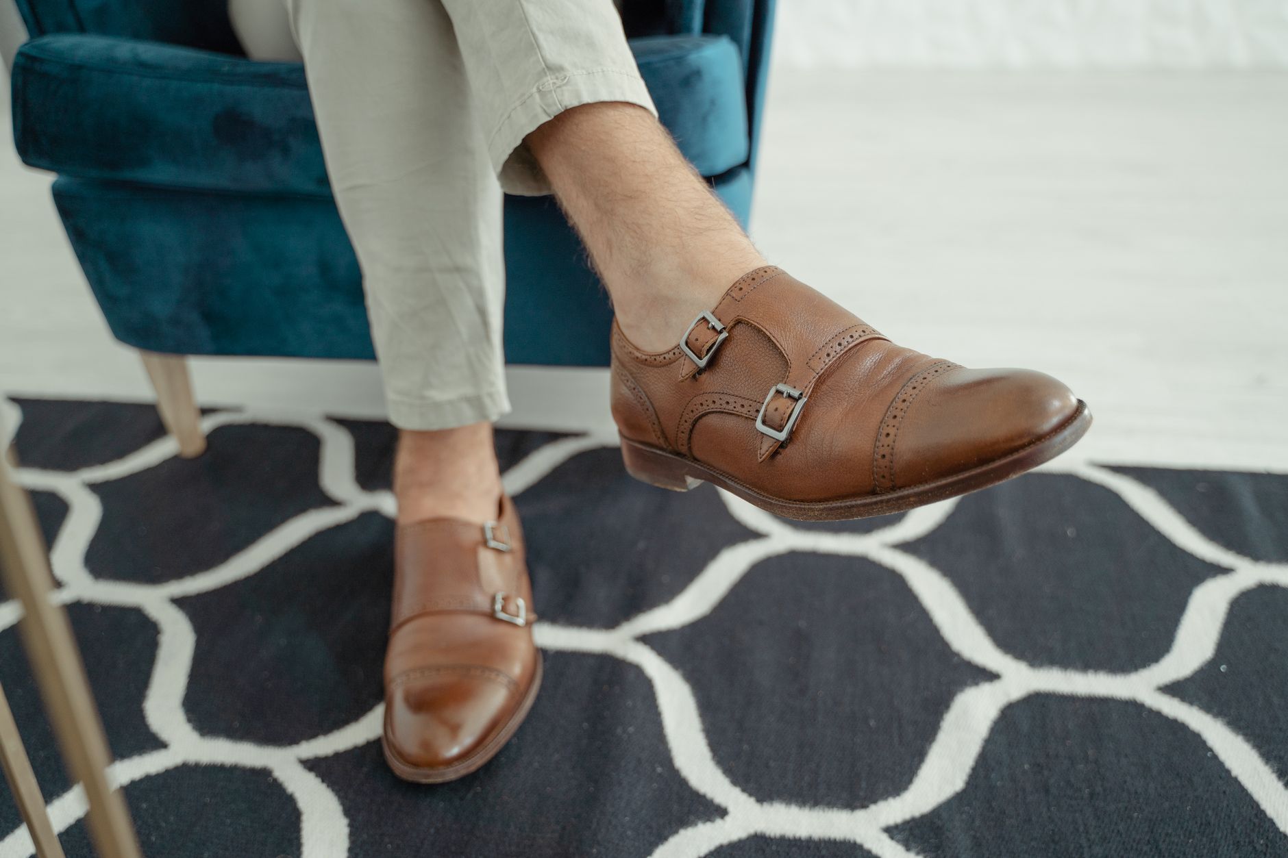 Detail shot of luxury footwear showing intricate woven textile upper and clean silhouette