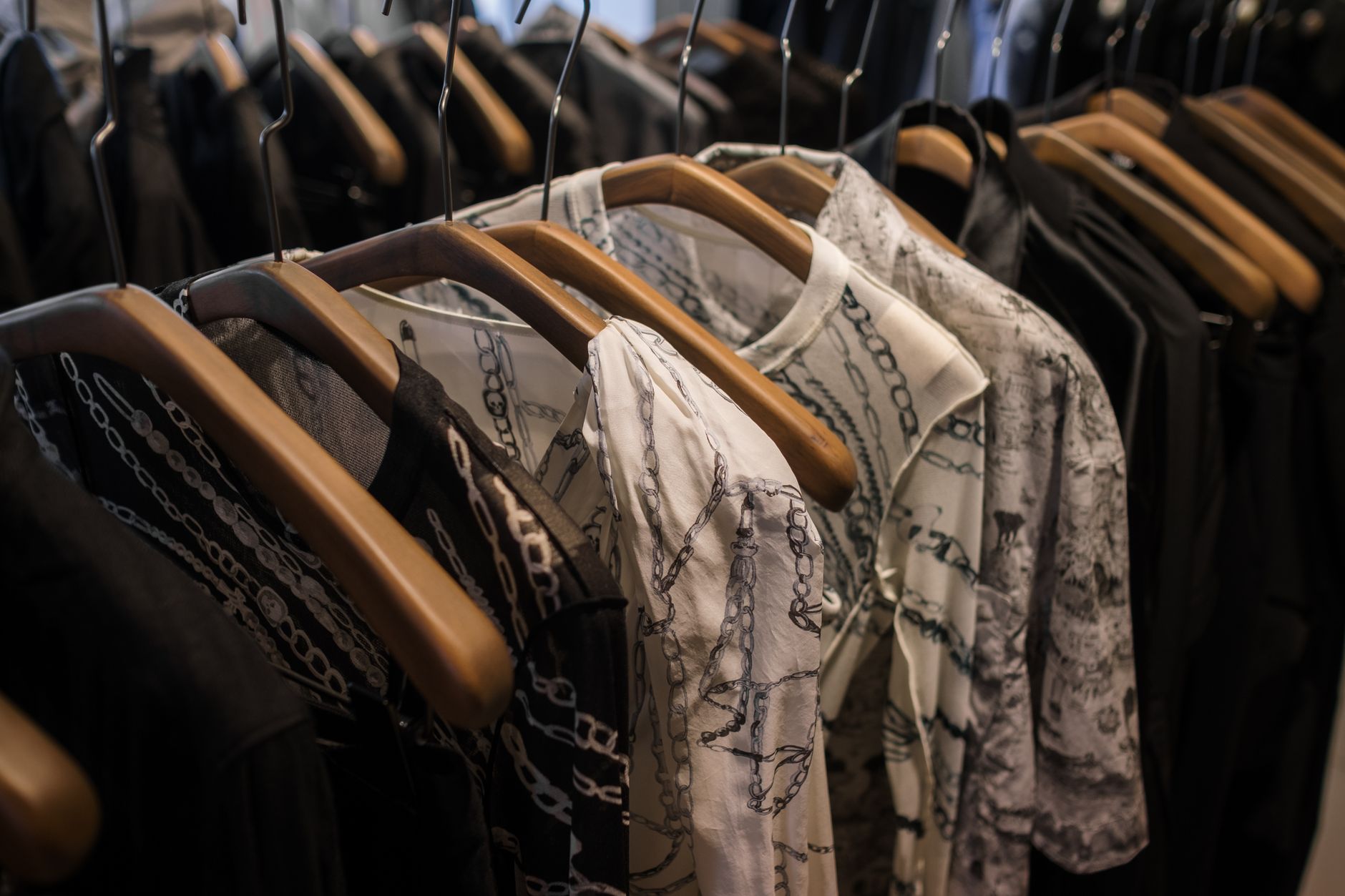 Neatly arranged luxury shoes and accessories in a wardrobe