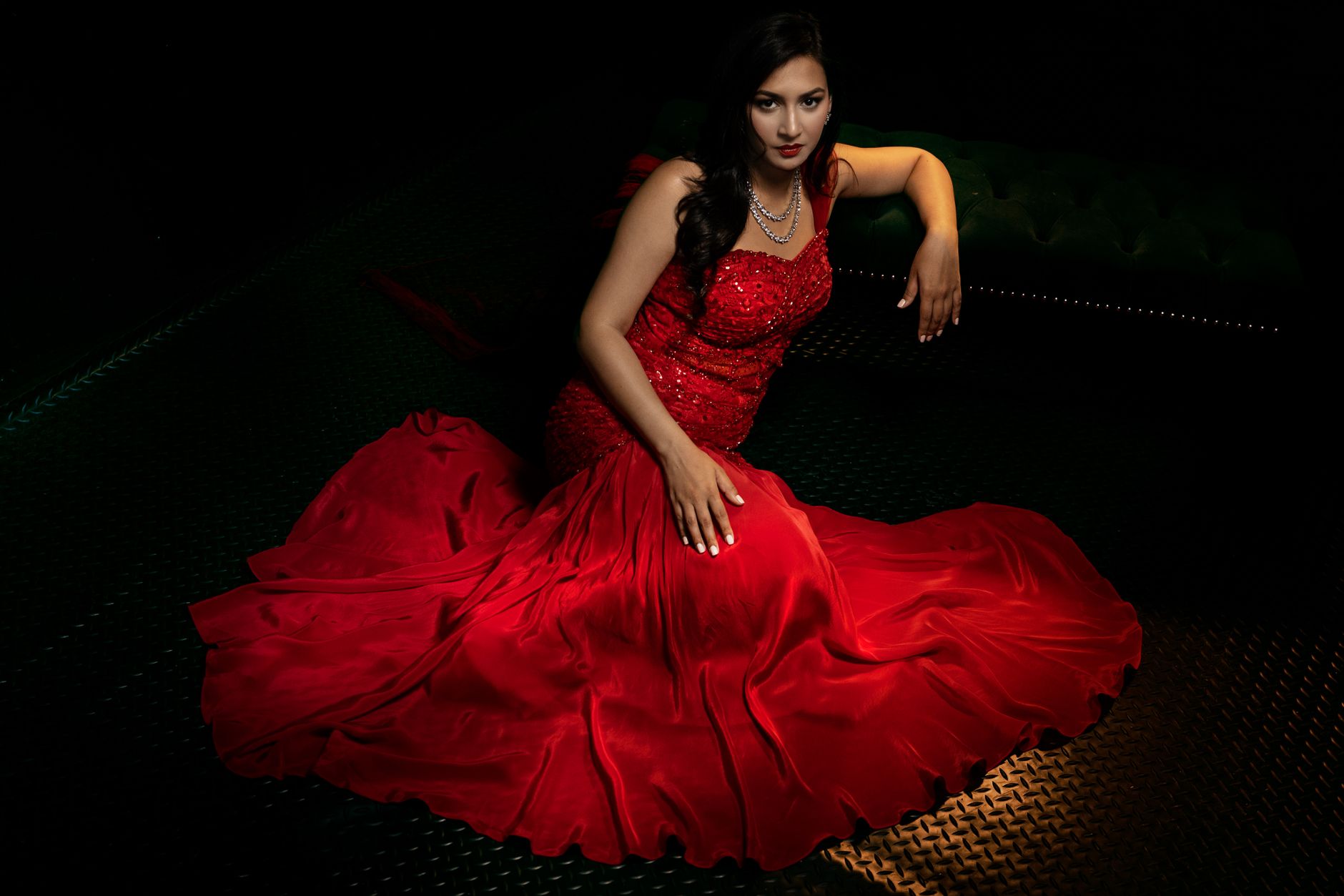 Celebrity in a statement designer look at a red carpet event