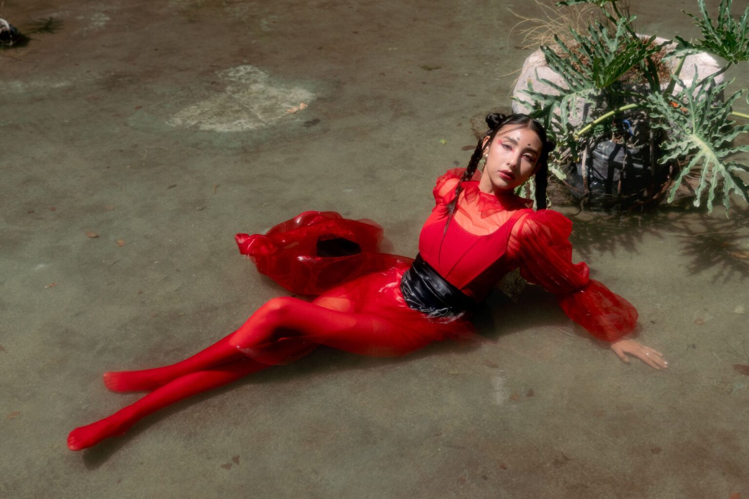 Valentino’s Rosso Collection Is Quietly Reclaiming Red’s Luxury Status A bold red fashion editorial look showcasing luxury garment construction and fabric quality