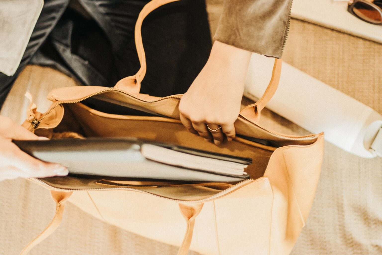 Proenza Schouler’s Structured Tote Is Edging Out the Shopper A structured leather tote bag with clean lines and minimal hardware on a neutral background