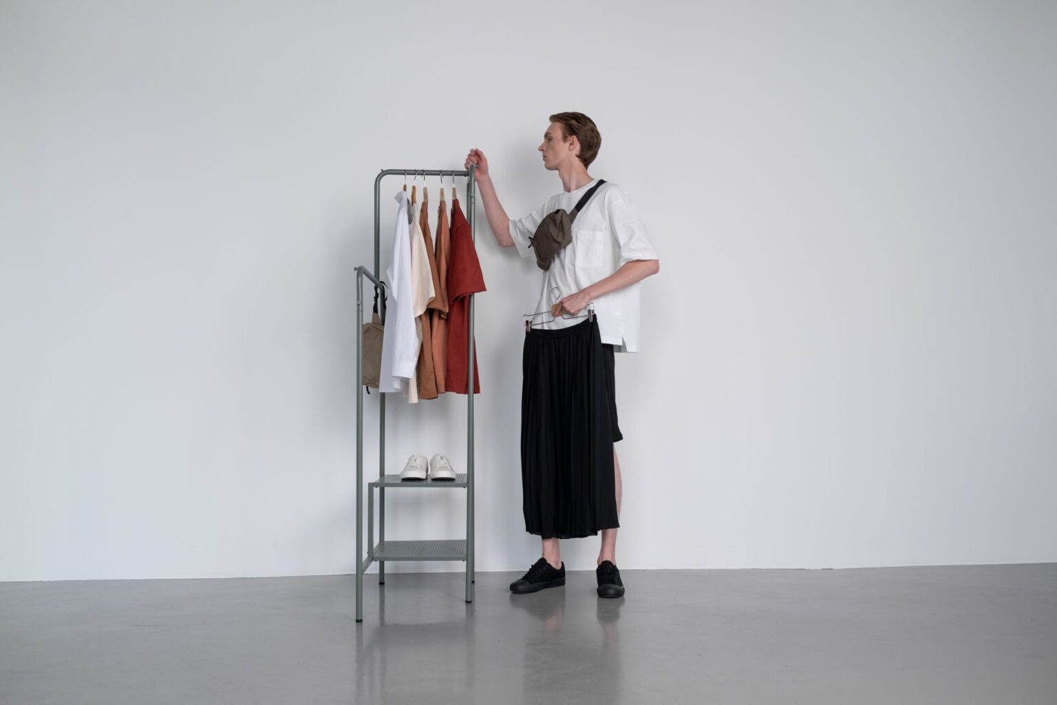 Helmut Lang’s Archive Is Quietly Pulling Resale Markets Upward Minimalist fashion garments displayed on a clean rack, representing archival designer clothing