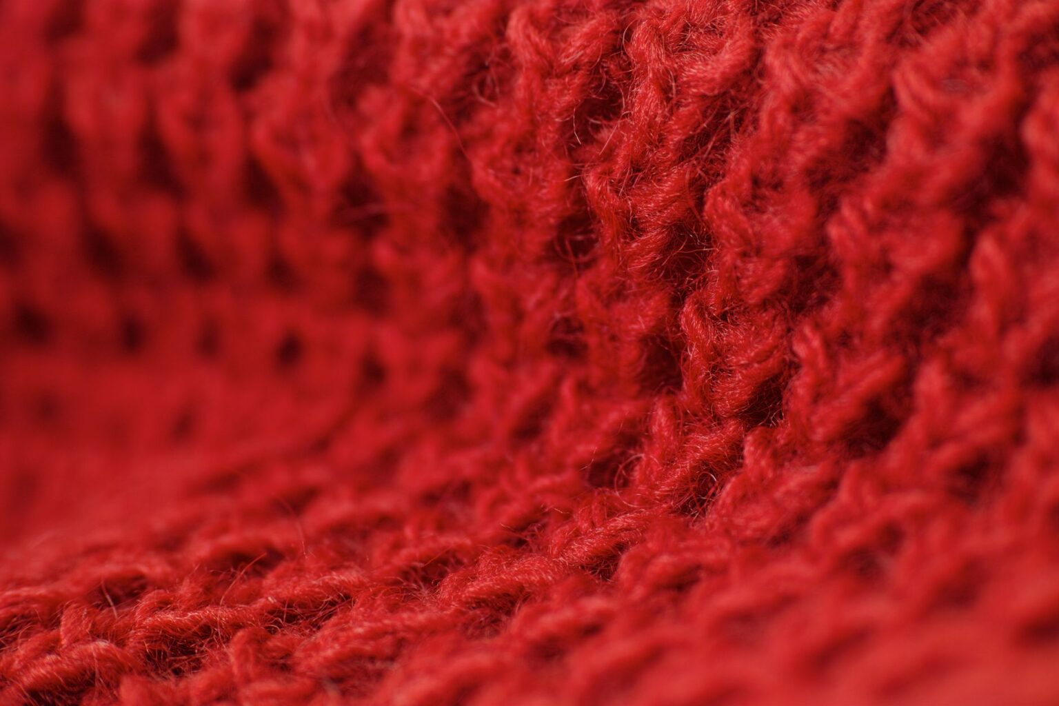 Acne Studios’ Mohair Knit Is Quietly Edging Out the Cashmere Sweater Close-up of a fuzzy mohair knit sweater showing soft halo fiber texture