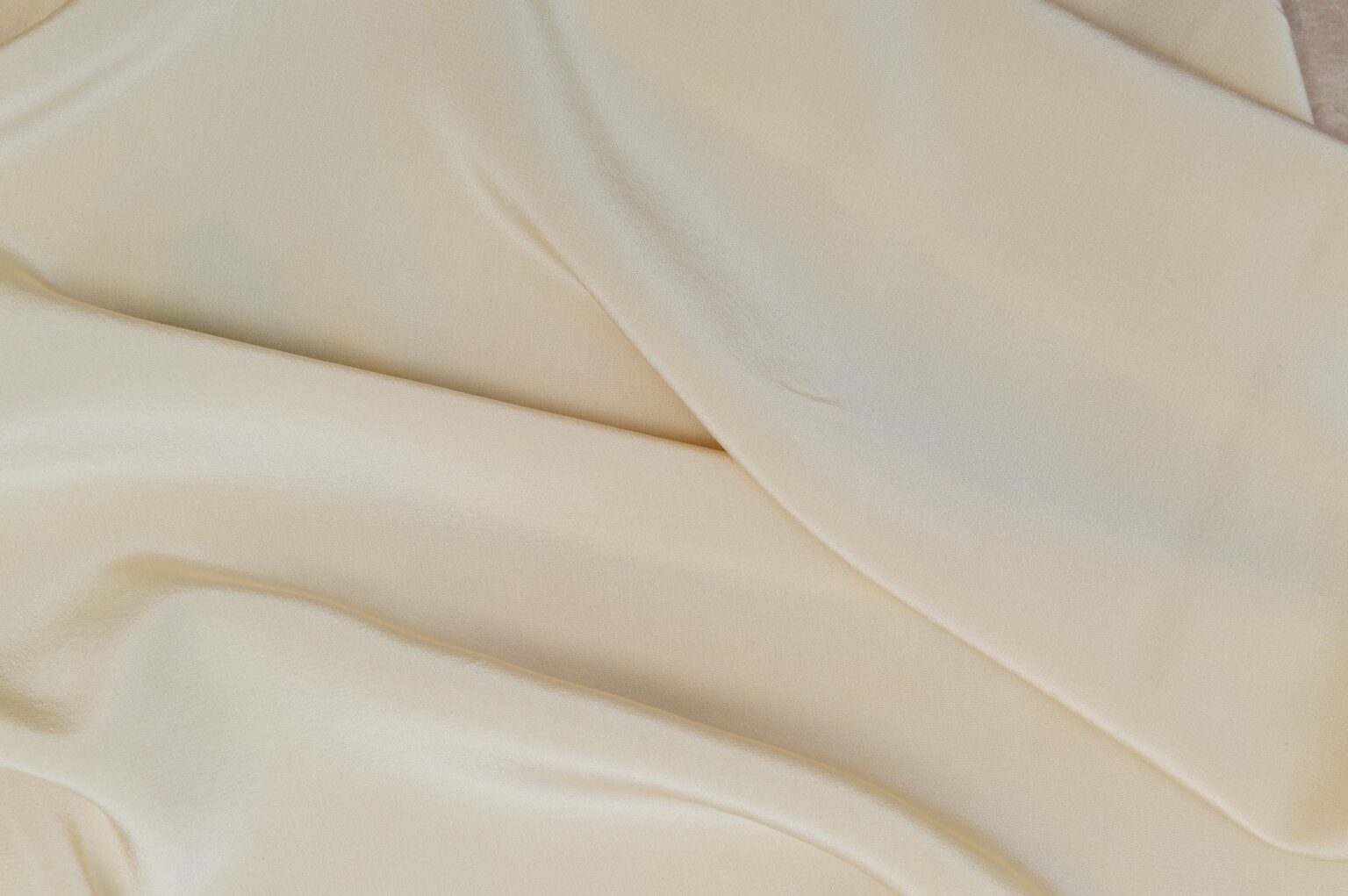 Dries Van Noten’s Fluid Midi Skirt Is Quietly Edging Out the Trouser A fluid silk midi skirt in a rich tone, showing natural movement and drape