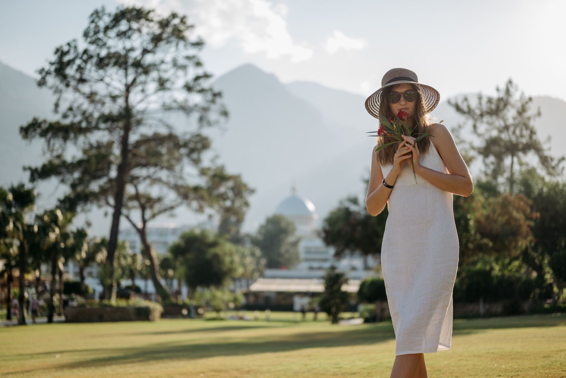 Relaxed linen summer outfit styled with open-toe sandals