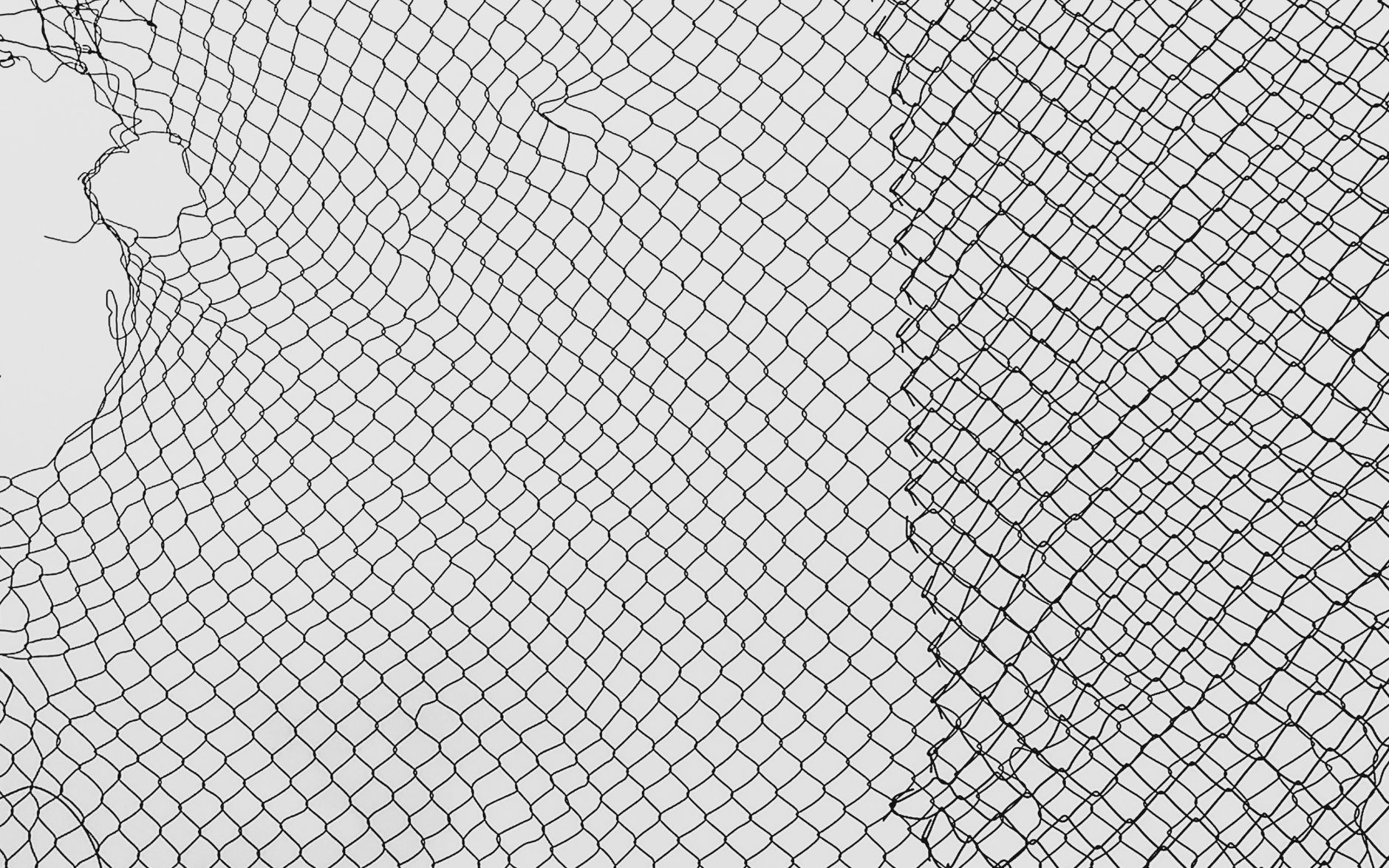 Close-up of smooth black nylon fabric texture with subtle sheen