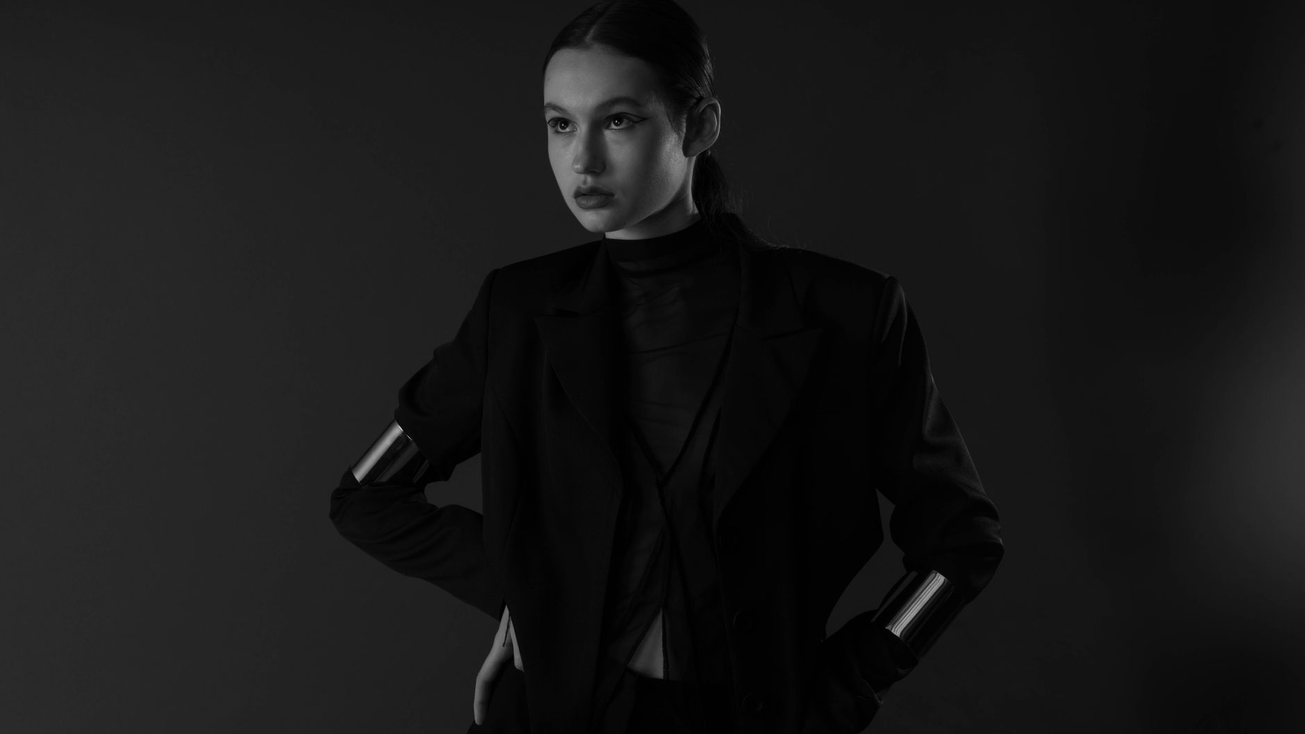 Minimalist fashion editorial showcasing structured trouser silhouette
