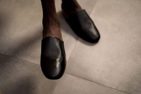 Valentino’s Kitten Mule Is Quietly Edging Out the Strappy Sandal Elegant kitten heel mules displayed on a clean surface, showcasing structured toe box and slender heel design