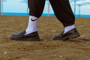 The Mesh Loafer Is Quietly Edging Out the Canvas Sneaker Close-up of a pair of mesh loafers on a neutral background