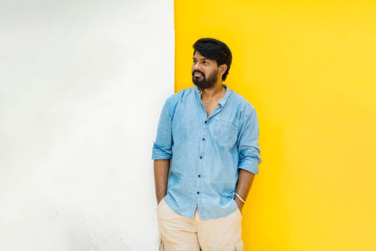 Man wearing a relaxed natural linen shirt in neutral tones