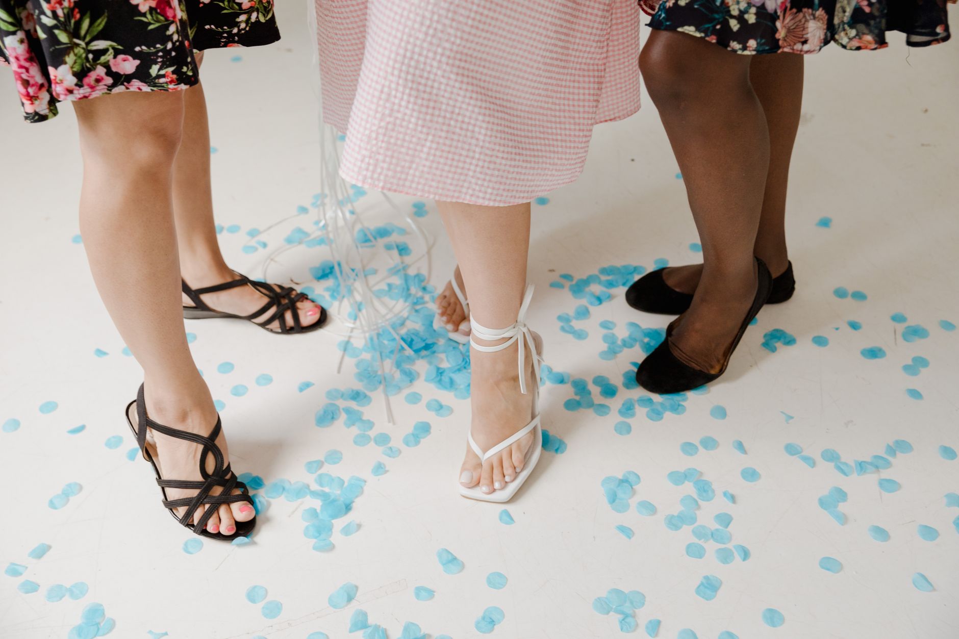 Close-up of a kitten heel sandal on a light background