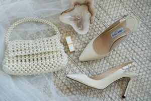Close-up of a classic slingback pump in a neutral tone on a polished surface