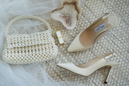 Close-up of a classic slingback pump in a neutral tone on a polished surface